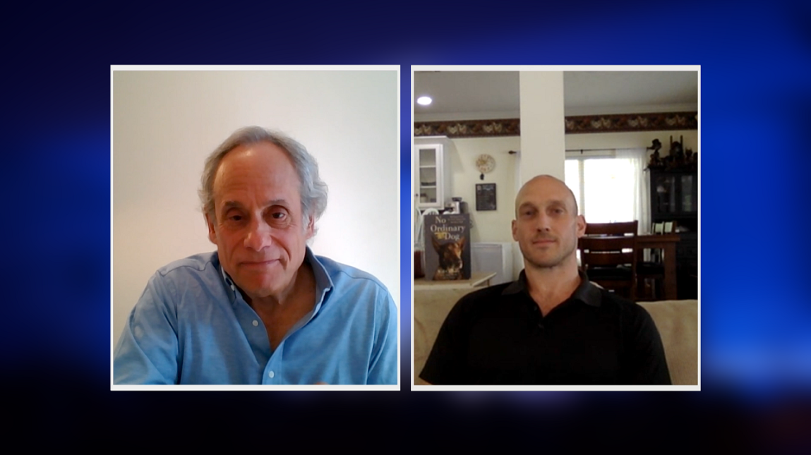 A screenshot of two men engaged in a video chat.