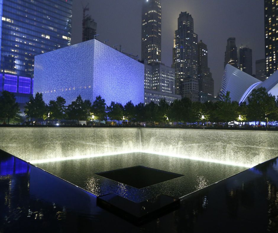 Memorial illuminated in blue at night