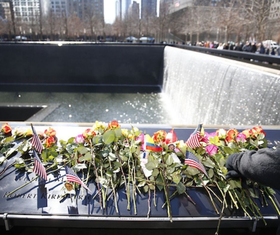 Colorful flowers placed in tribute on the Memorial