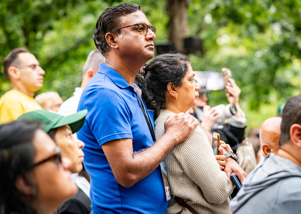 family members support each other during the ceremony