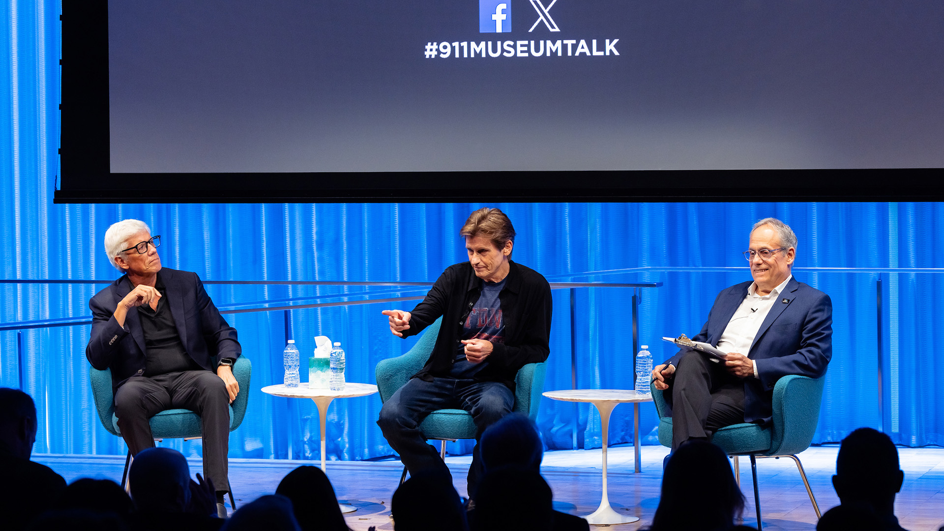 Peter Tolan (left) sitting on stage with Dennis Leary (center) and Museum Director Clifford Chanin (right)