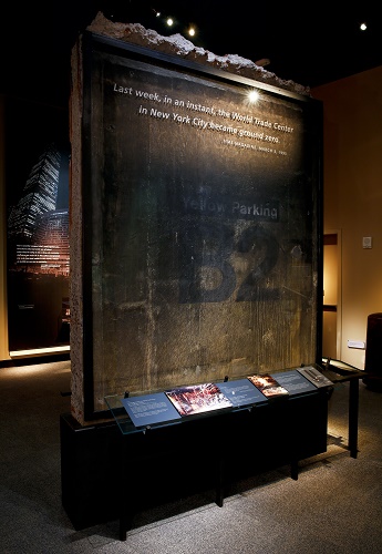 Installation of wall fragment from the World Trade Center parking garage, B2 level (Photo by 9/11 Memorial staff)