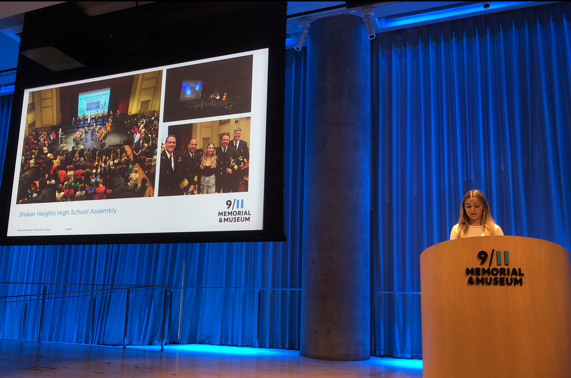 Young woman stands at 9/11 Memorial & Museum podium